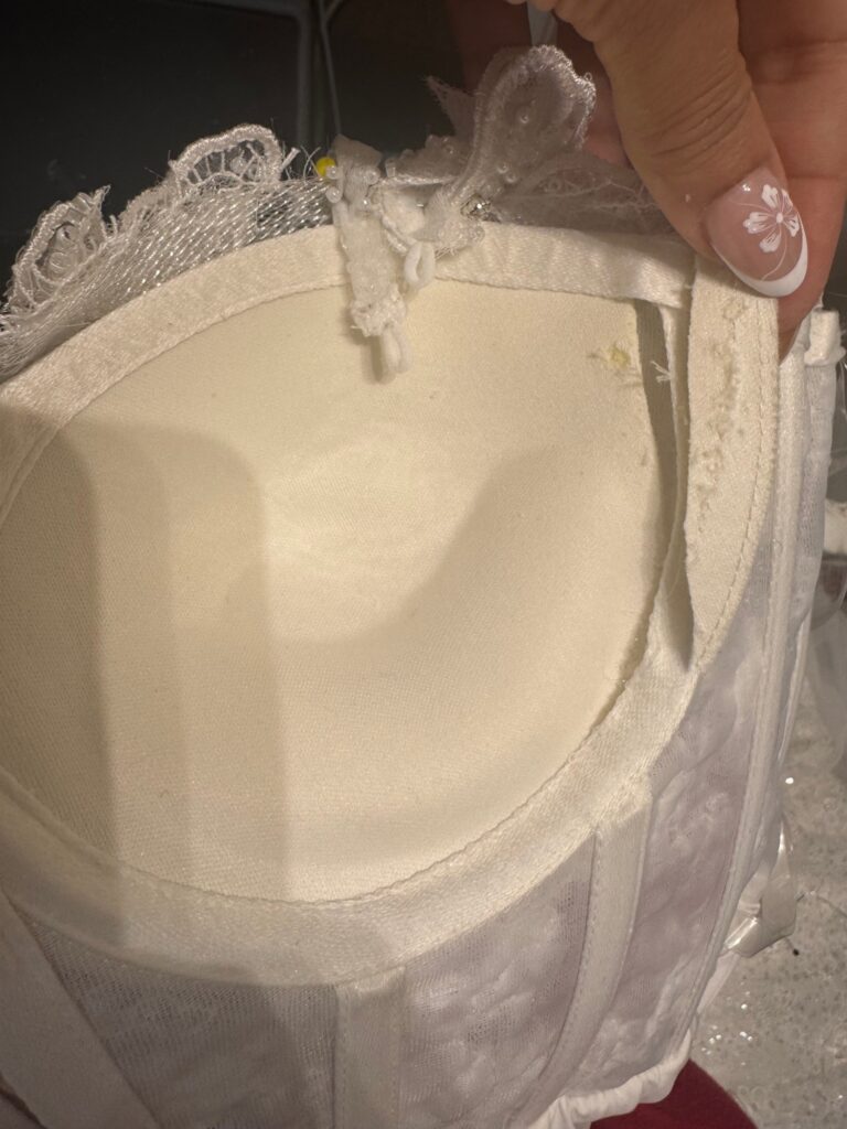 Inside bodice of a Ricca Sposa Como wedding dress after expert cup reduction