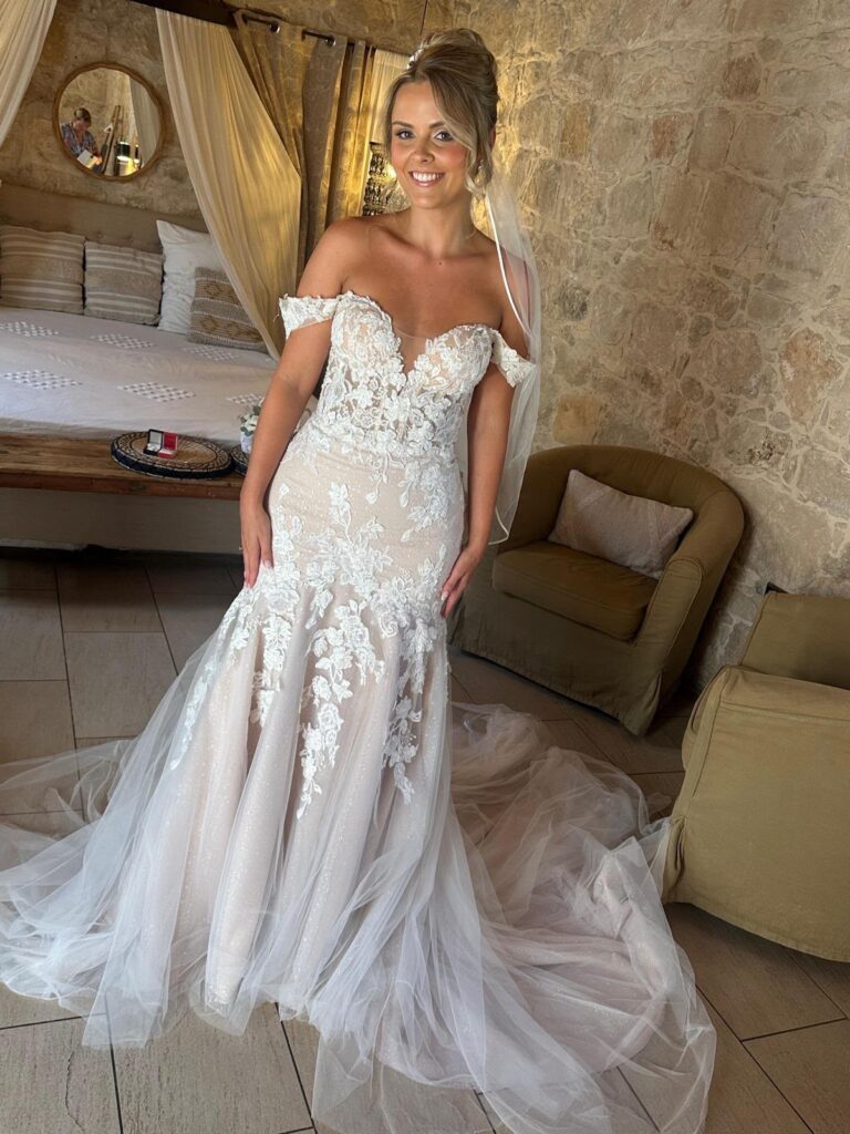 Outlet by Aurora sample bridal gown lace train back view