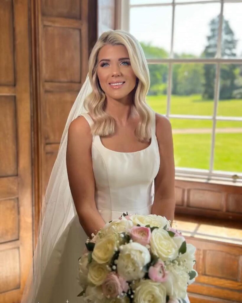 Expert Mikado wedding dress alterations showing the perfectly fitted Stella York bodice.