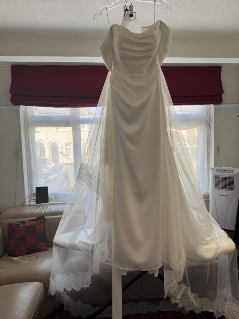 WED2B Luka wedding dress and cathedral veil professionally steam pressed before collection