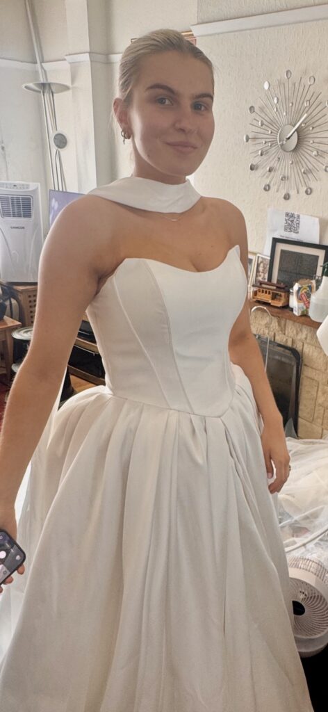 Tooting bride Bethan wearing altered Stella York wedding dress close up of bodice.