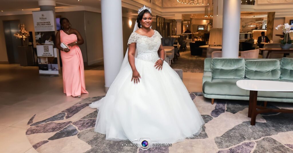 Coulsdon bride on wedding day wearing bespoke altered Morilee wedding dress