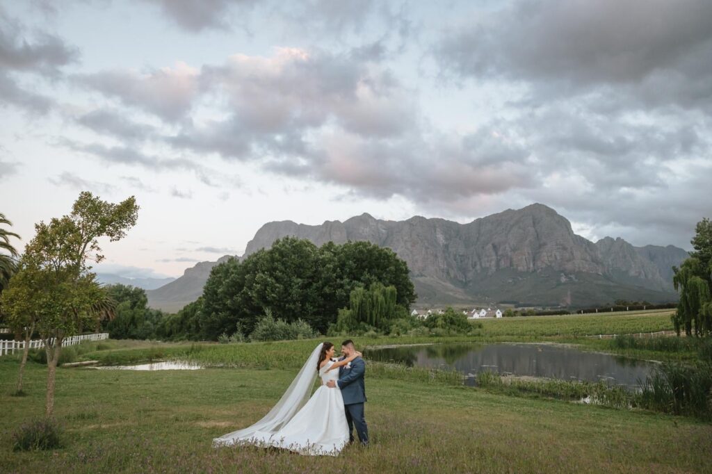 Wandsworth bridal alterations for an Essense of Australia wedding dress reduced by four sizes showing veil train and dress in South Africa Destination wedding.