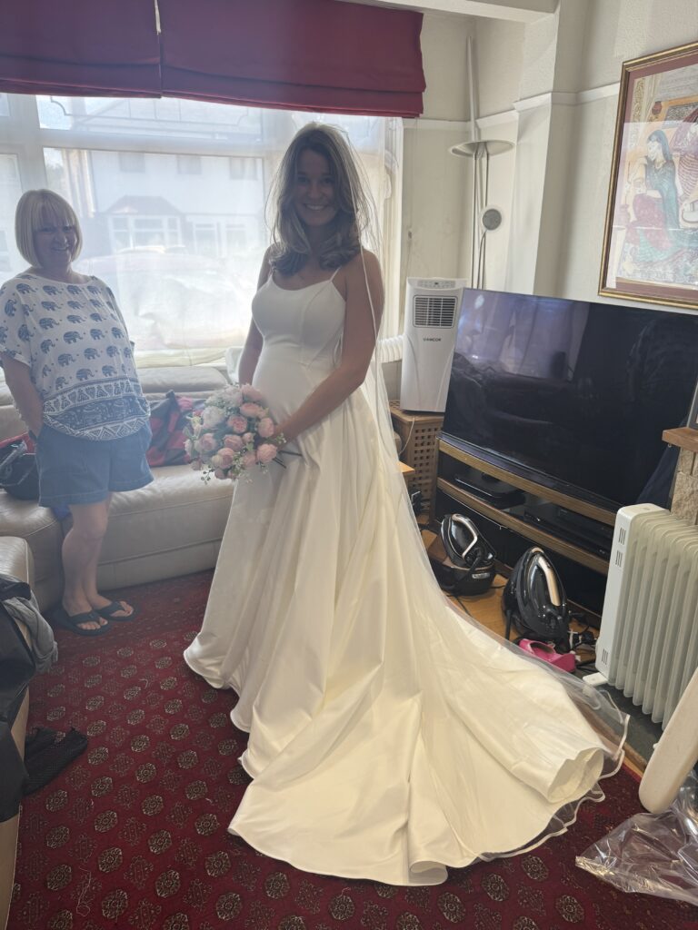 Pregnant bridal alterations Carshalton first fitting at three weeks to wedding so it was appropriate time for baby bump for s precise hem.
