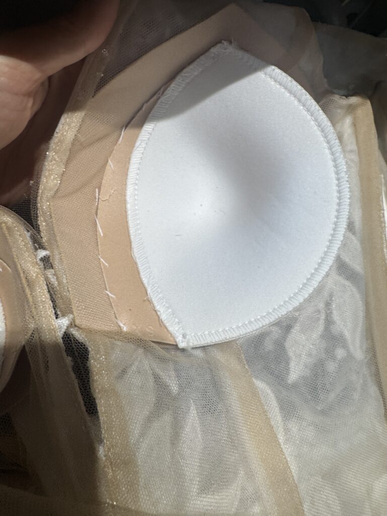 extra cup was added at an angle for better support to bust and a push up bust cup look.