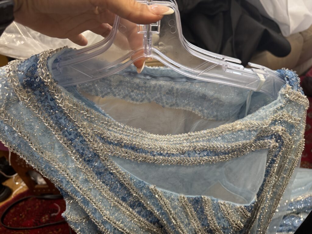 Heavily beaded mother of the bride evening dress alterations hem and shoulder fitted to perfection.