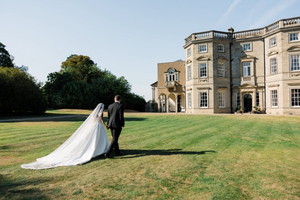 Uxbridge Bridal Alterations outside the wedding venue gardens.