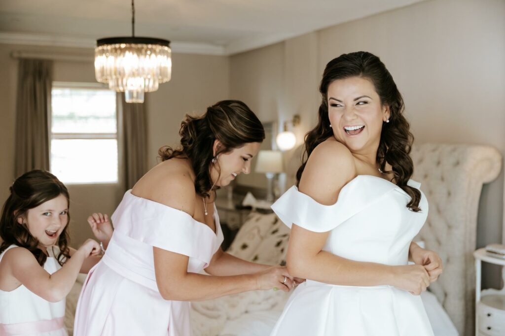 Wandsworth bridal alterations for a Essense of Australia wedding dress reduced by four sizes sister closing her dress.
