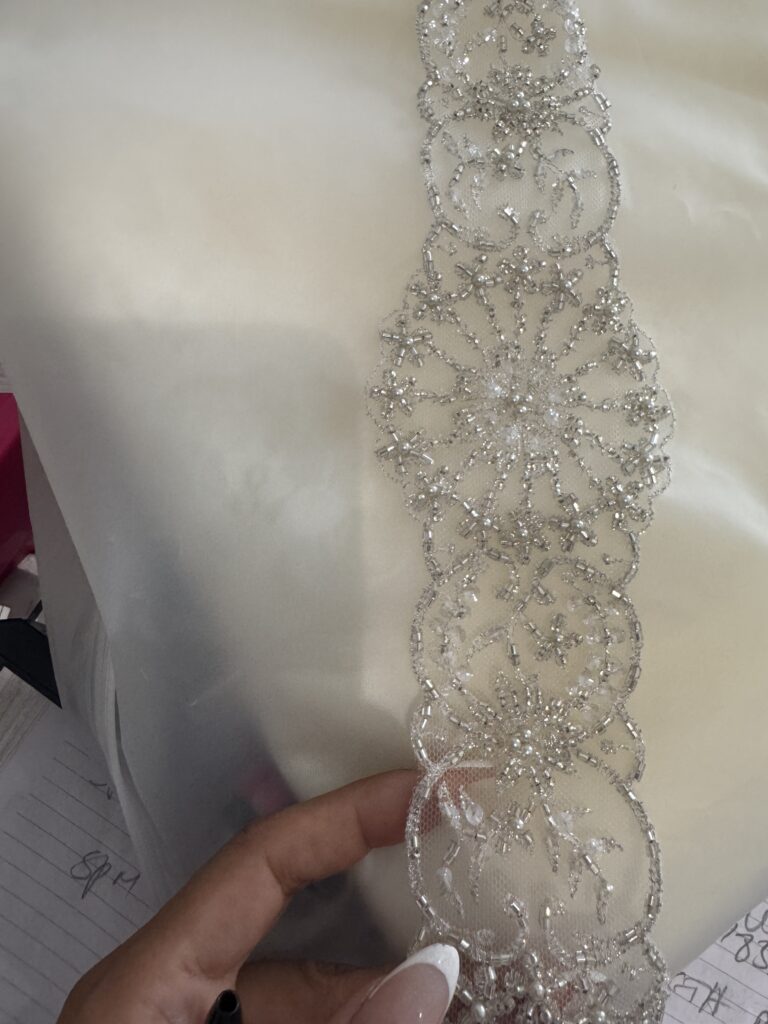 Hand beaded trim used to change top design