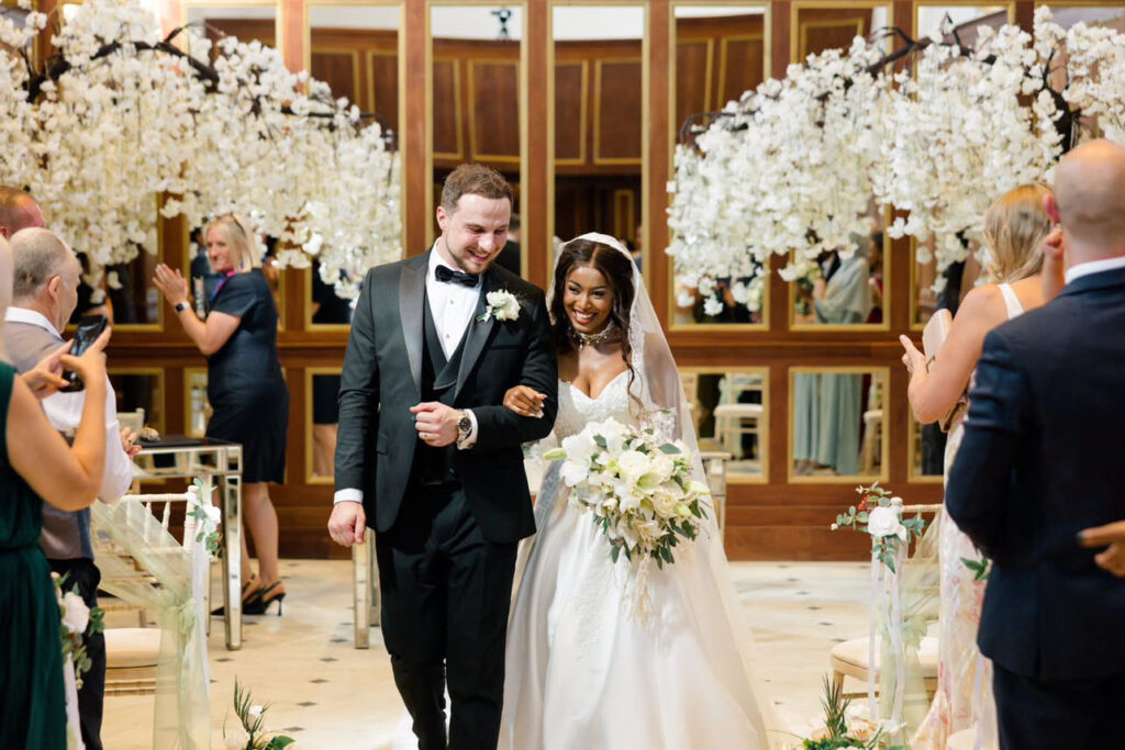 ceremony picture showing the Jules Wed2b dress fully transformed.