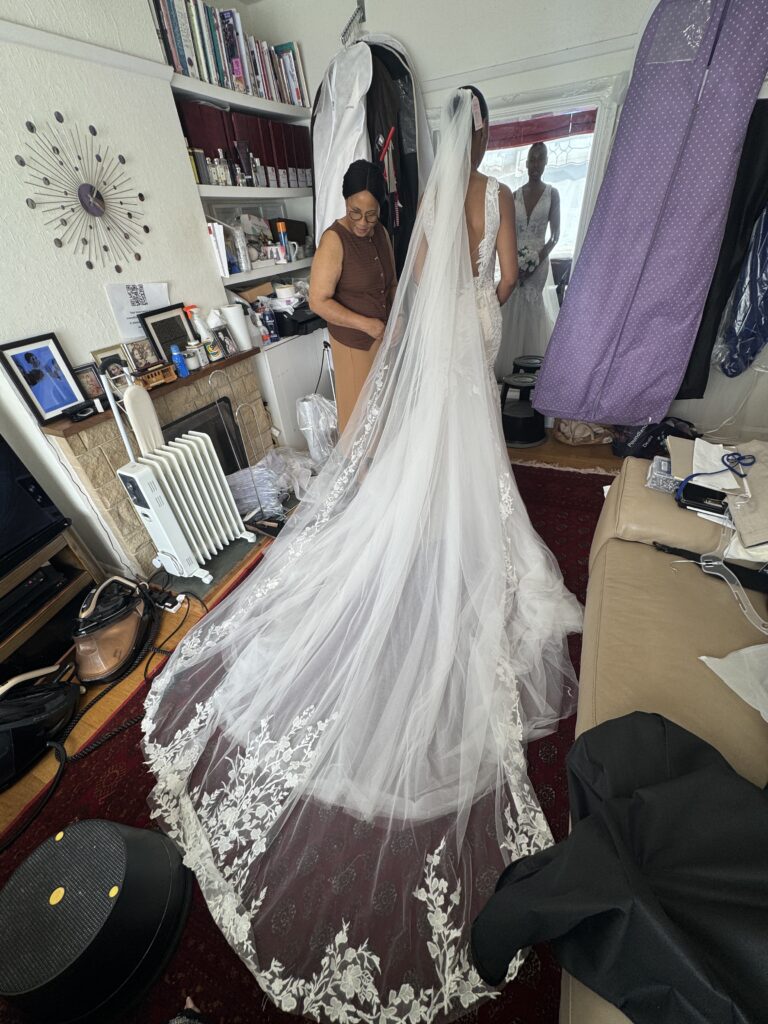 Mitcham bride showing the finished fit of her Daria Karlozi Kristavera wedding dress
