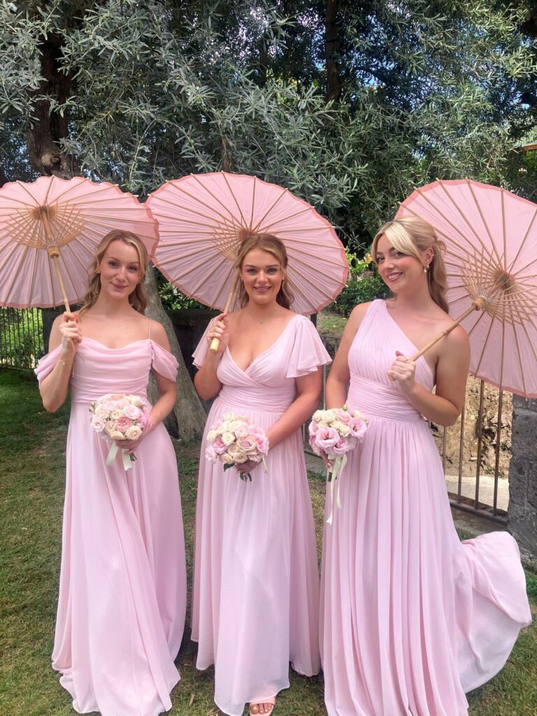 Three Bridesmaid dresses alterations on blush pink chiffon gowns for a destination wedding in Italy