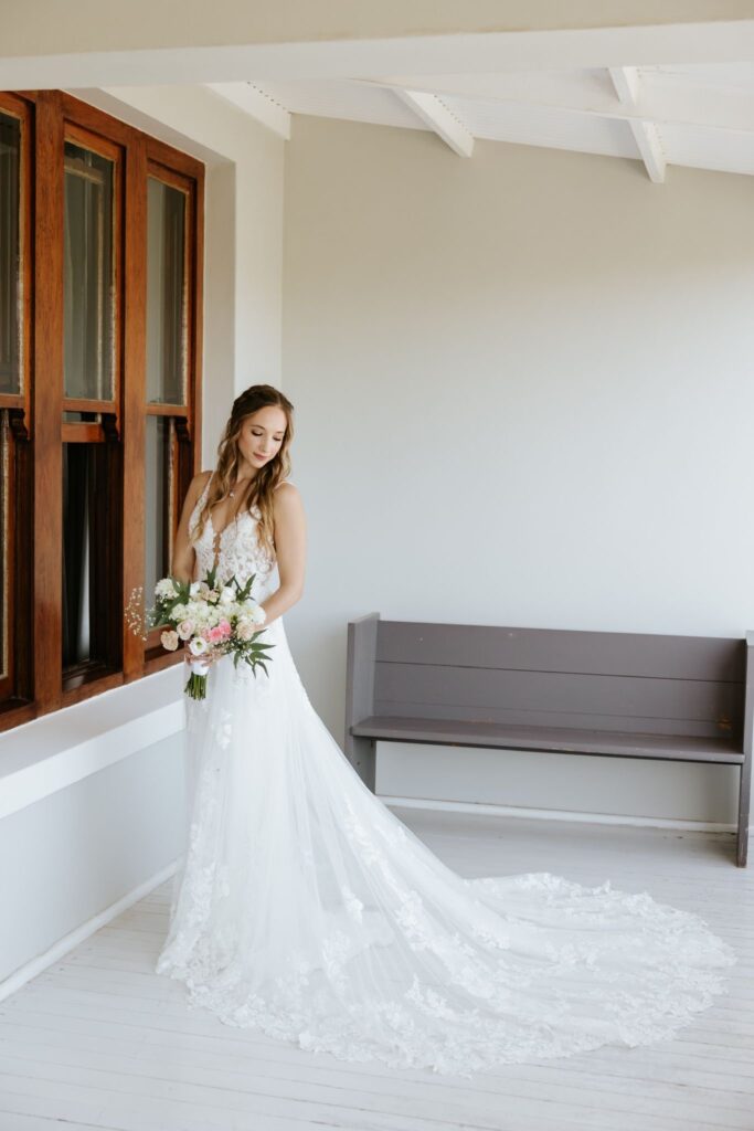 Full-length view of Richmond Upon Thames Bride lace gown after bridal alterations