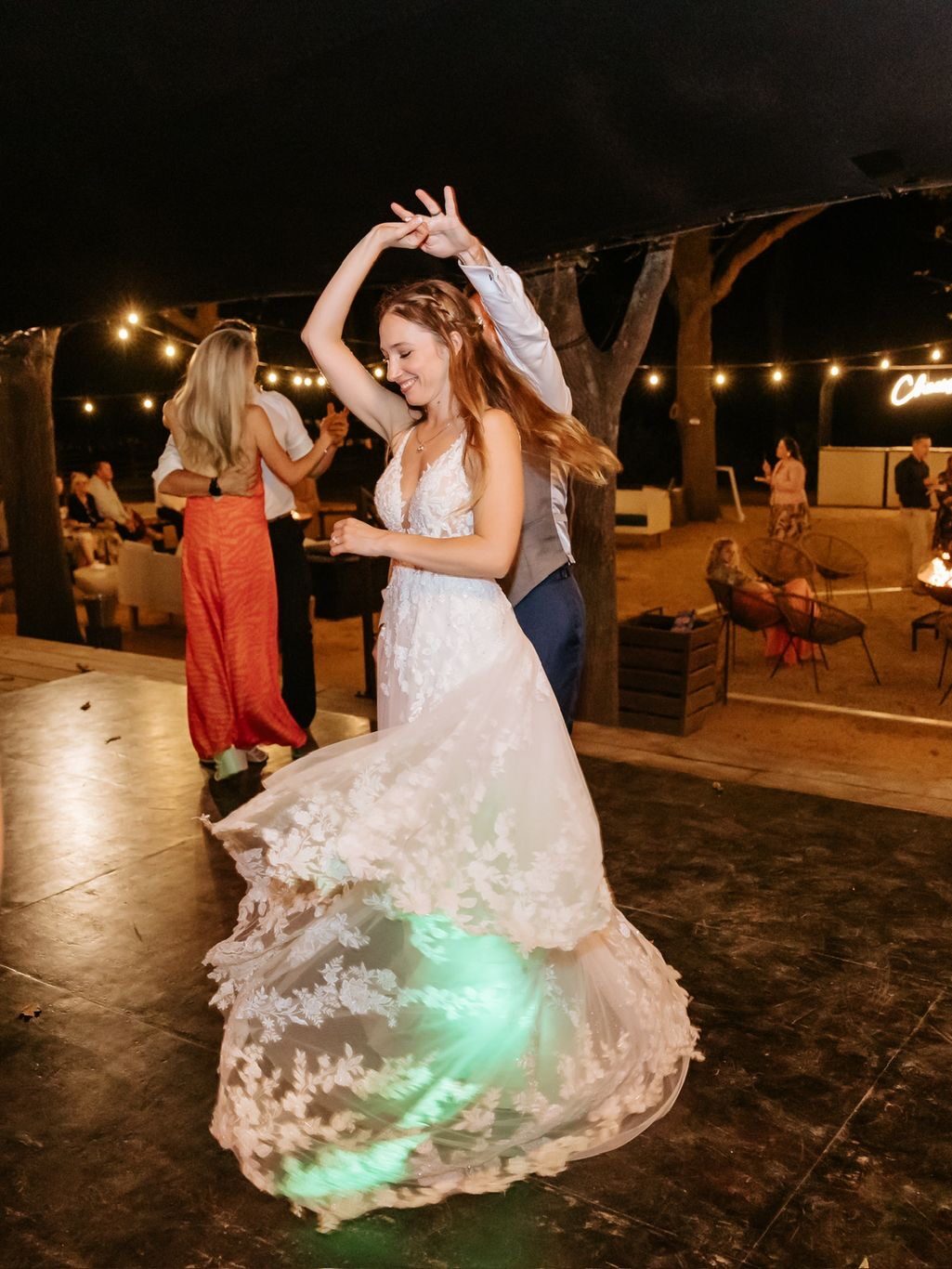 Dancing away the night bride on the dance floor with groom.