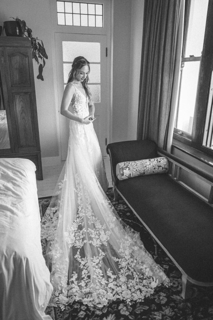 Train view of Richmond bride’s wedding dress transformation after couture adjustments to her Roma dress from Aurora Bride.