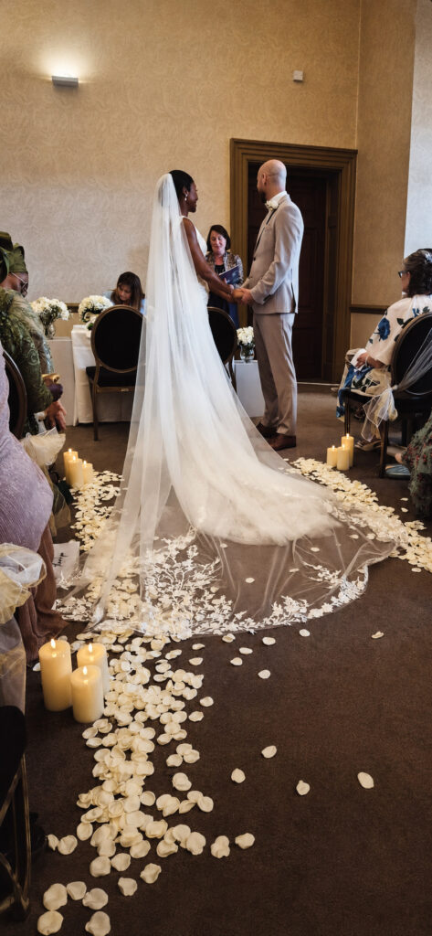 Mitcham bride showing the finished fit of her Daria Karlozi Kristavera wedding dress
on the ceremony 