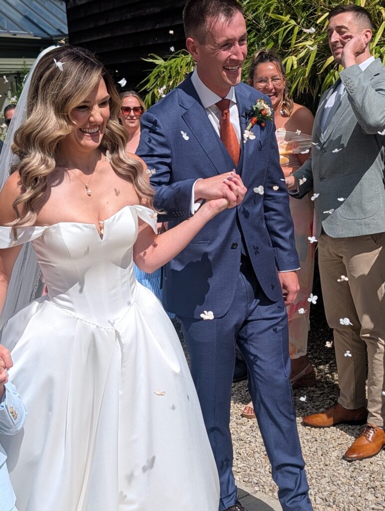 Molesey bride wearing her altered wedding dress after professional bridal fitting