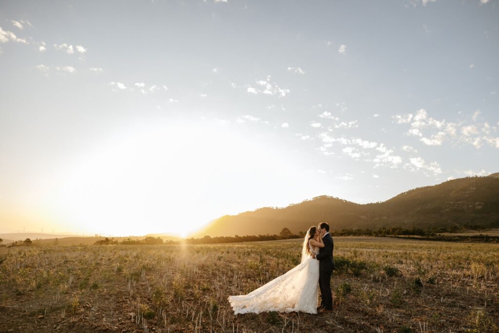 Richmond upon Thames bride wearing her altered lace wedding dress at sunset
