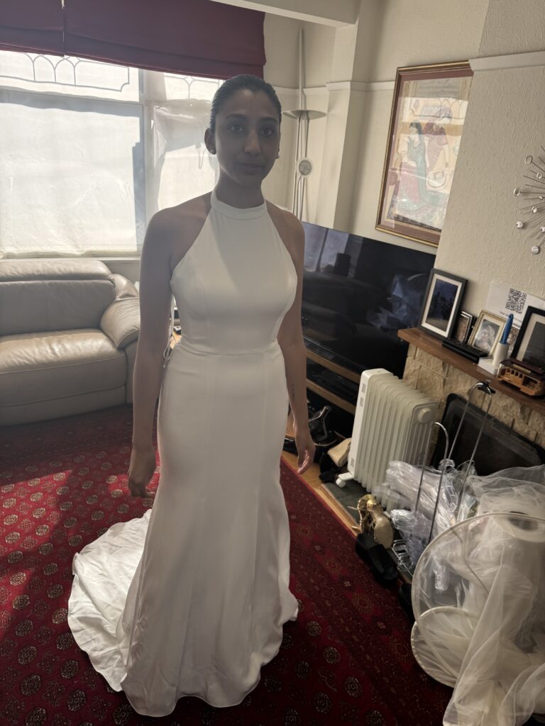 Nadiya wearing her altered Sofia Cruz Robbie wedding dress from WED2B Horsham at final
Fitting in my London Studio.