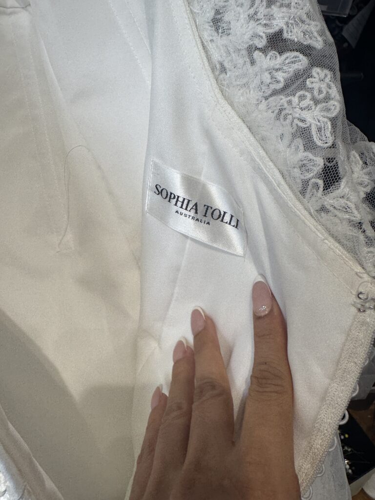 Sophia Tolli Australia designer label on Jo’s lace wedding dress