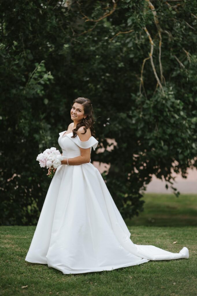 Wandsworth bride wearing her expertly altered wedding dress in Stellenbosch South Africa collar detail fully reapplied.