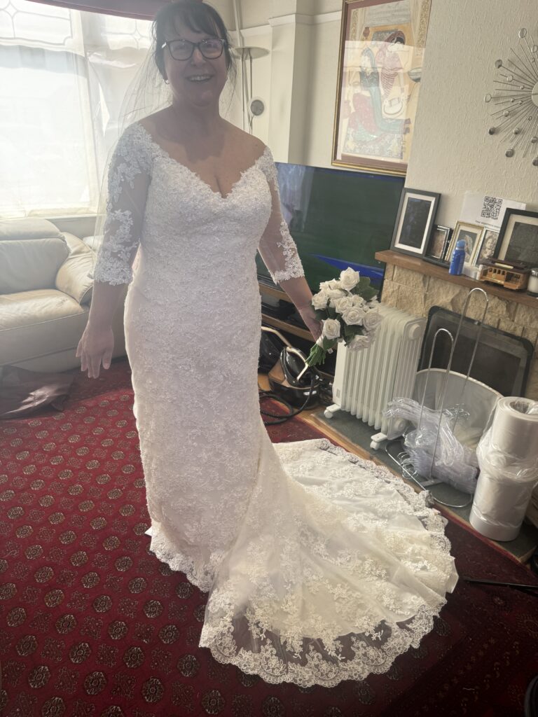Jo wearing her Sophia Tolli lace wedding dress after alterations at final fitting at my Sutton Studio in Greater London.