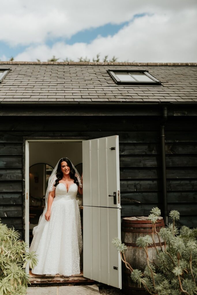 Wedding Dress Alterations Leatherhead Essense of Australia bridal dress with bespoke sleeves and completely altered neckline.