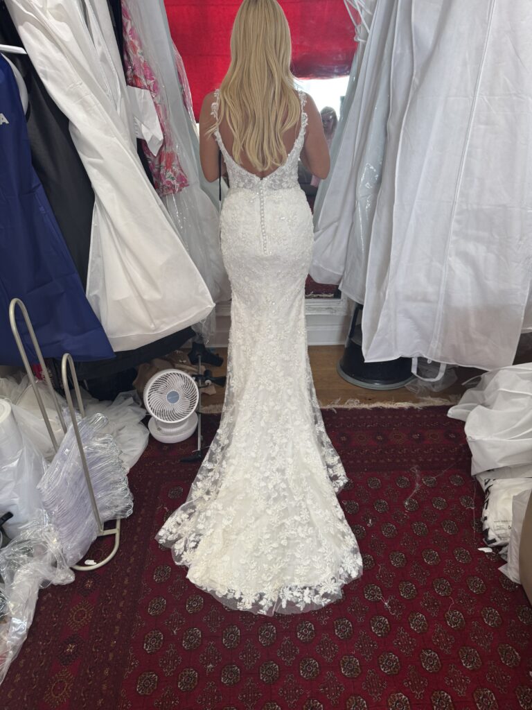 Hackbridge bride in altered Danielle Couture lace wedding dress at final fitting back view.