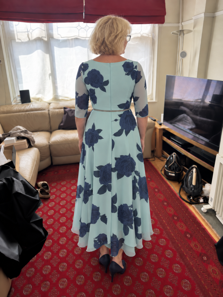 Veromia Occasion Wear Alterations lifted shoulders back view.