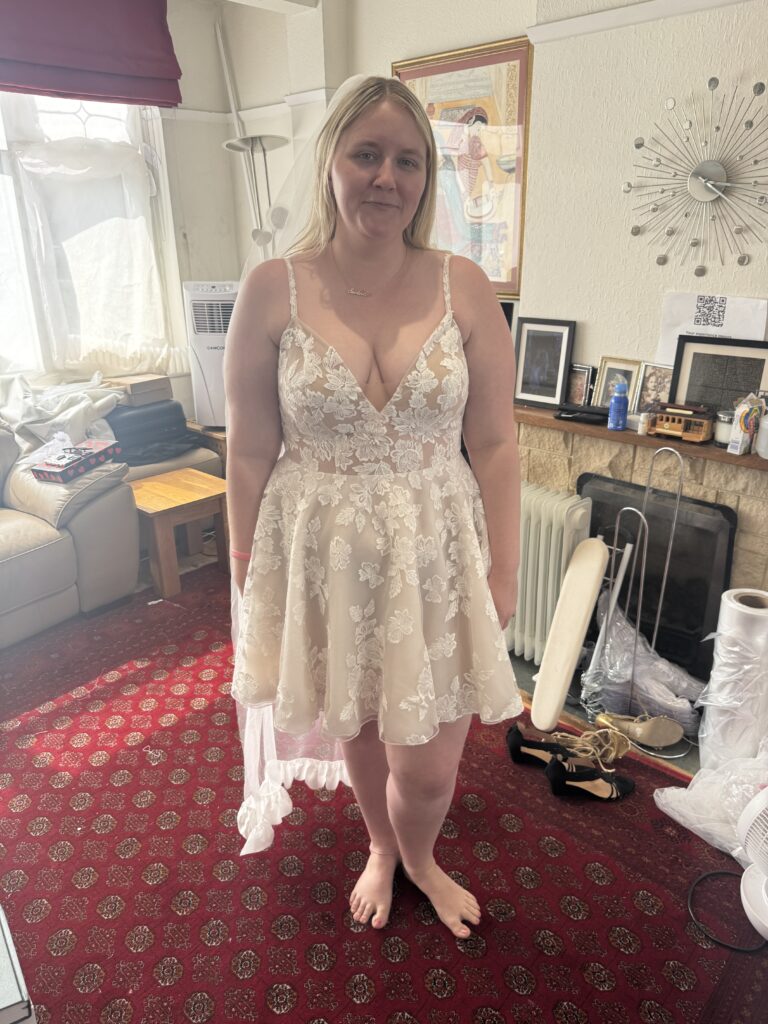 short Dama Couture Amanda lace wedding dress at my Greater London Studio.