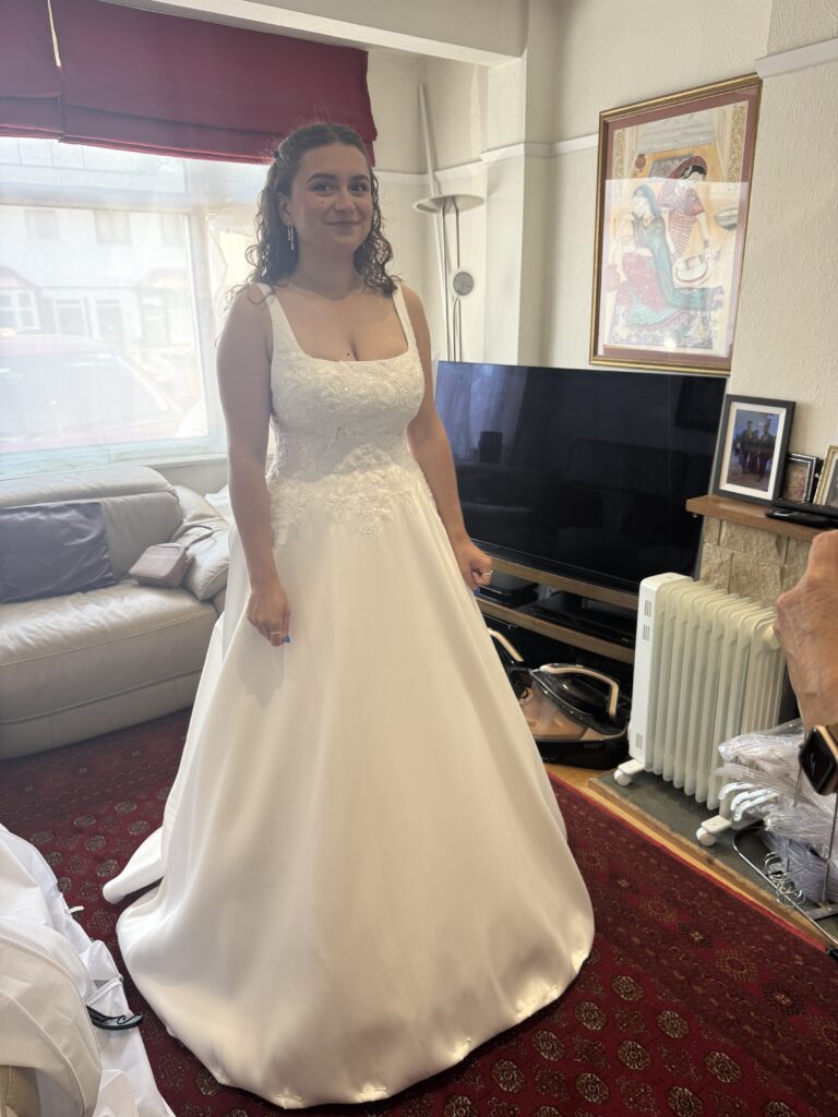 Stella York wedding dress alterations for a Bromley bride with the embroidered beaded lace back