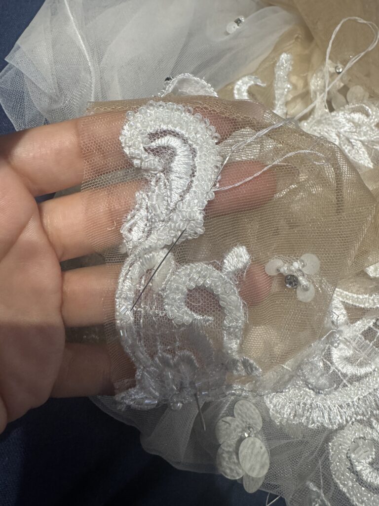 resewing sleeve hem Orpington bride’s altered Berta Muse Nila wedding dress