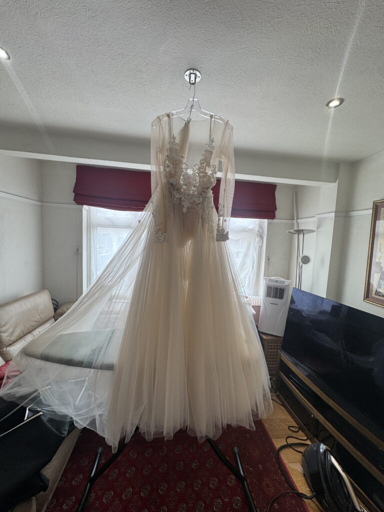 Orpington Bridal Altetations wedding dress fully steam pressed with matching veil.