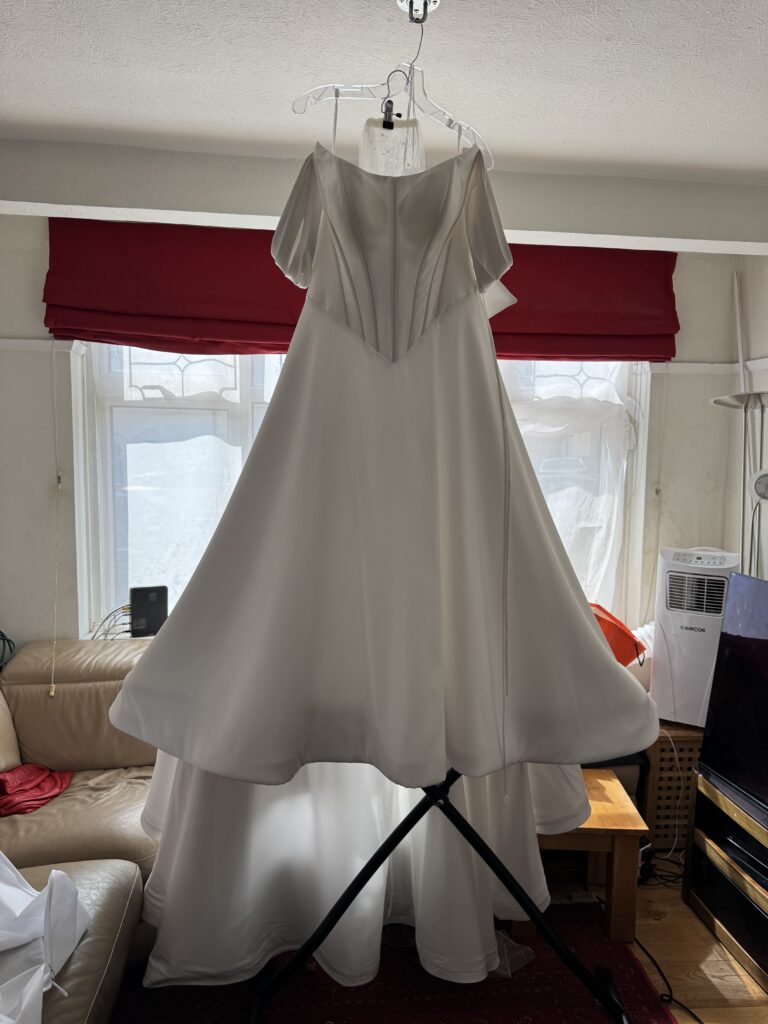Steam pressed dress and veil.