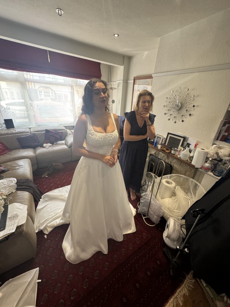 Stella York wedding dress alterations for a Bromley bride with the embroidered train fully displayed final fitting all adjustments finished.