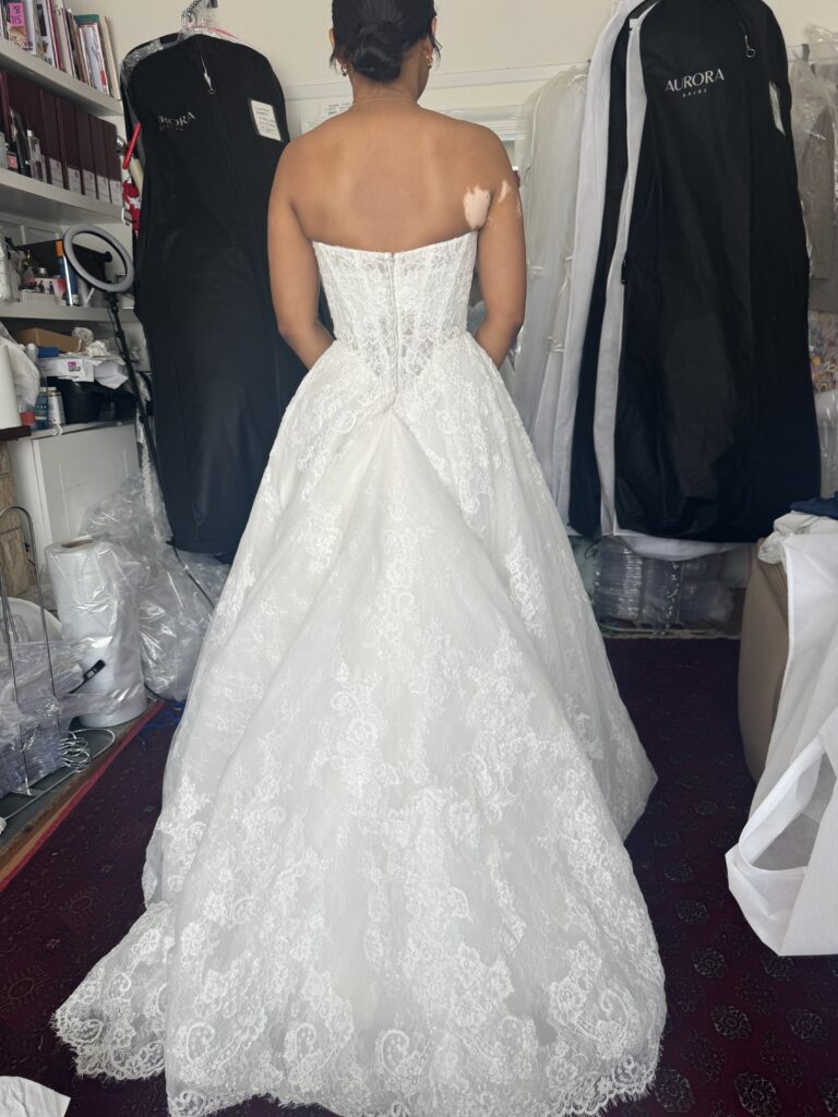 Back view of the Anna Sorrano Mercia wedding dress with the bridal bustle secured