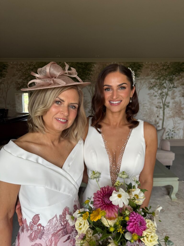 Bride in her essense of Australia wedding dress on her wedding day.