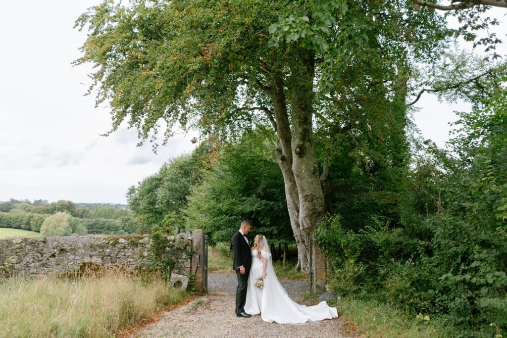 Isabella Grace Bridal Alterations long train of dress fitted to perfection worn by bride on wedding day.
