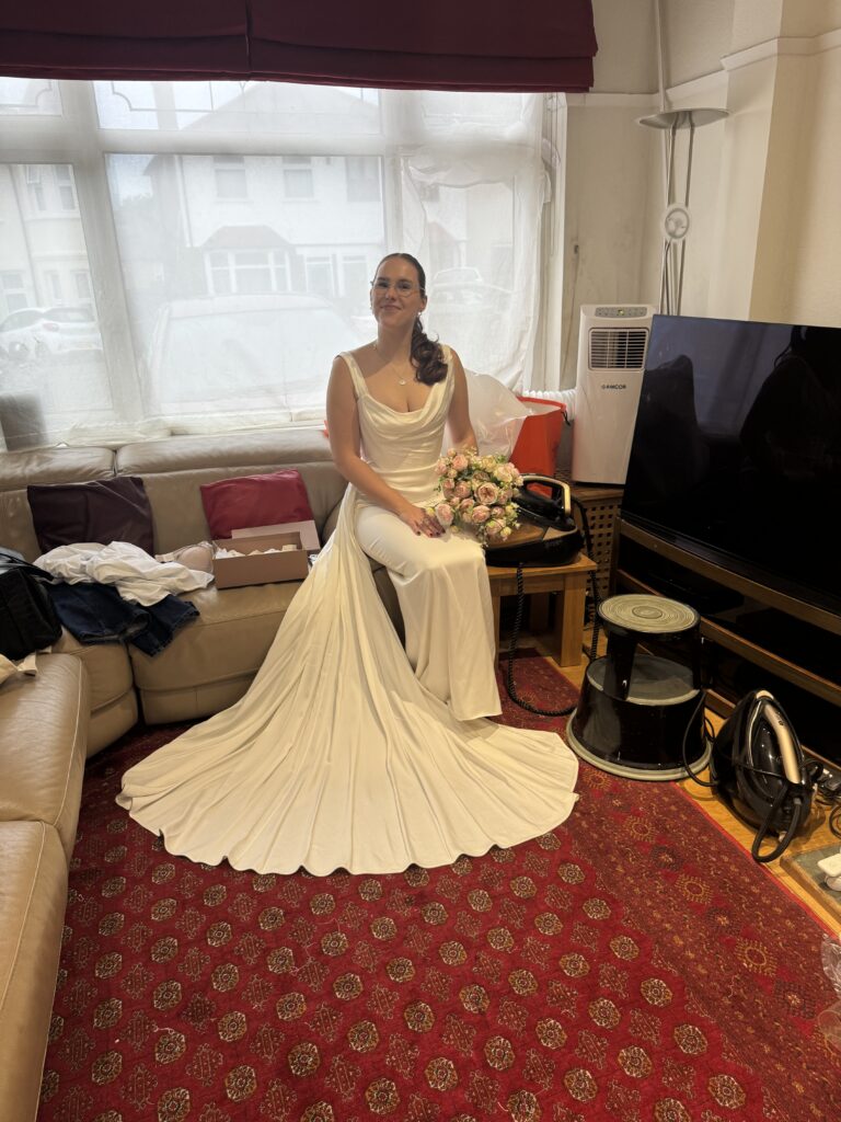 Vivienne Westwood bridal alterations for a Streatham bride wearing her Nova Grace wedding dress with finished alterations final fitting day.