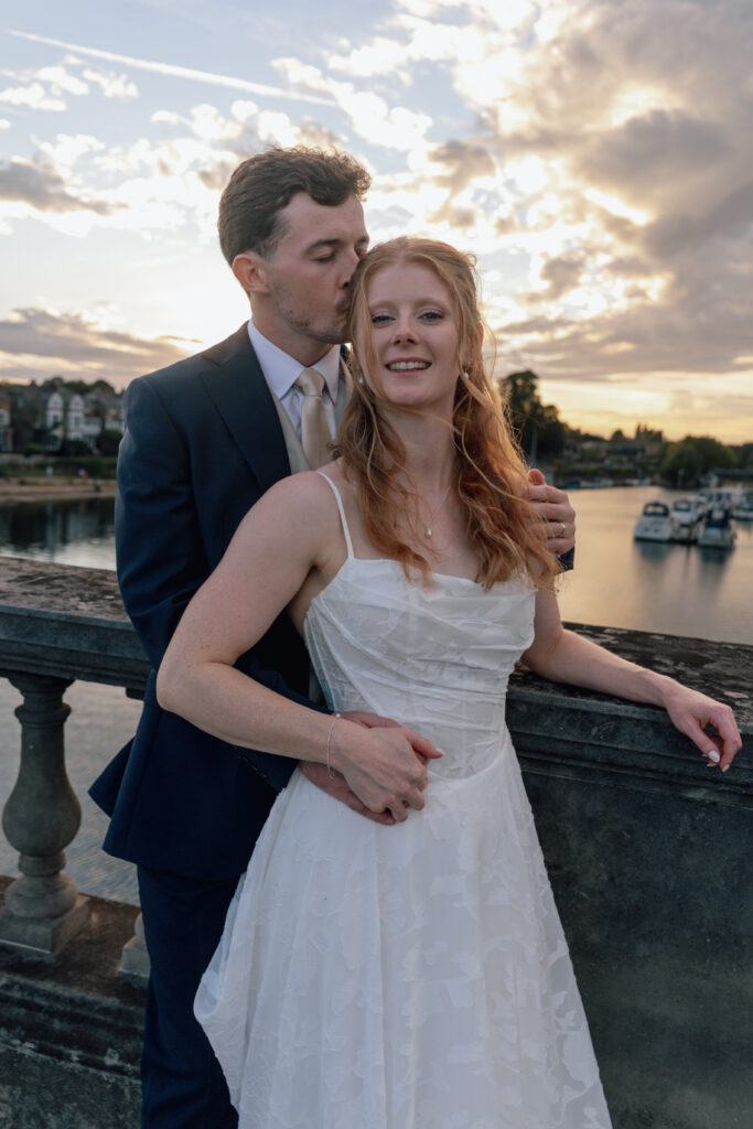 Bride wearing her stella York wedding dress on wedding day.