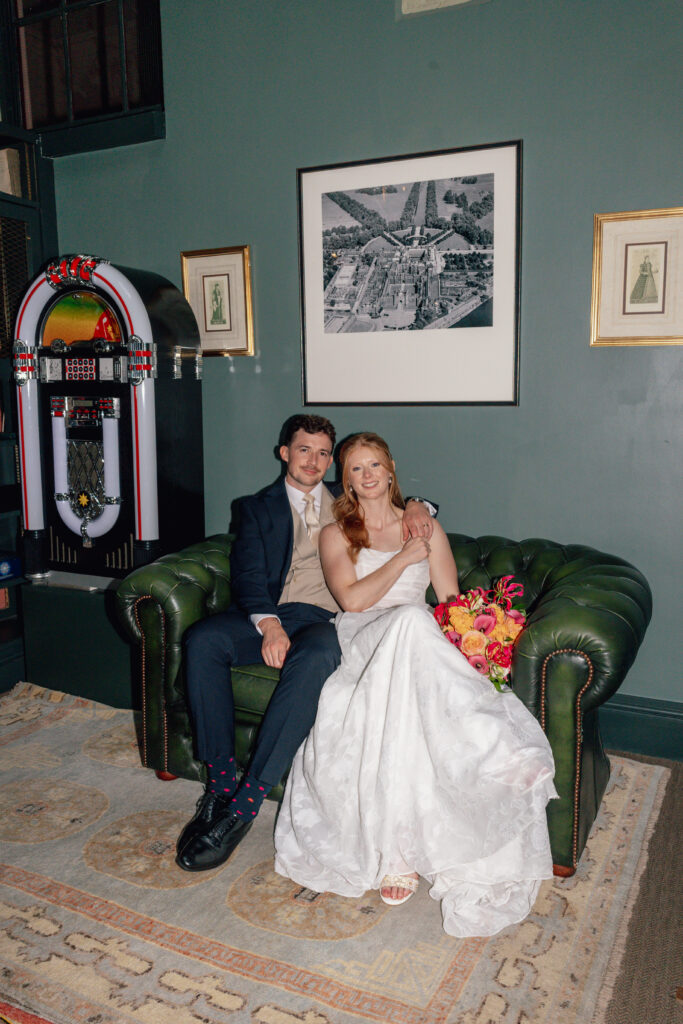 bride elegantly seated in ger wedding dress on wedding day.