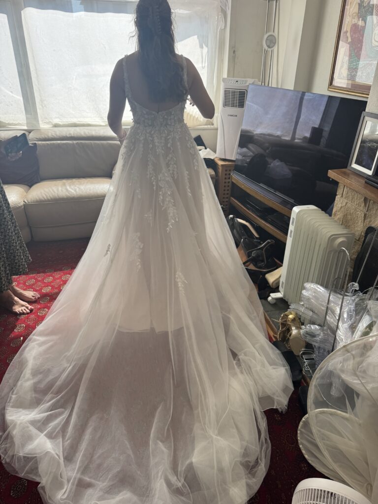 Stella York Crawley Bridal Alterations back view showing the long train in full glory.