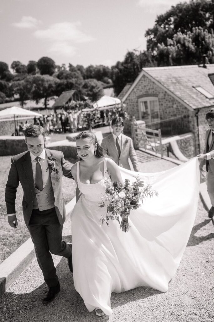 Bride wearing her altered Stella York wedding dress on her wedding day