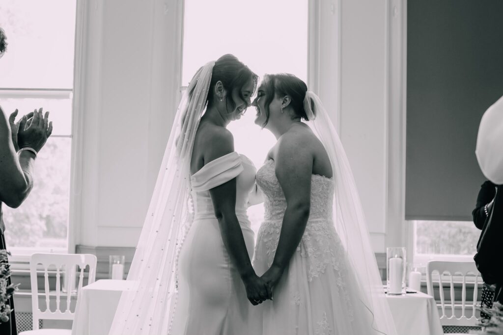 Two brides on their wedding day after WED2B bridal alterations near Fulham
