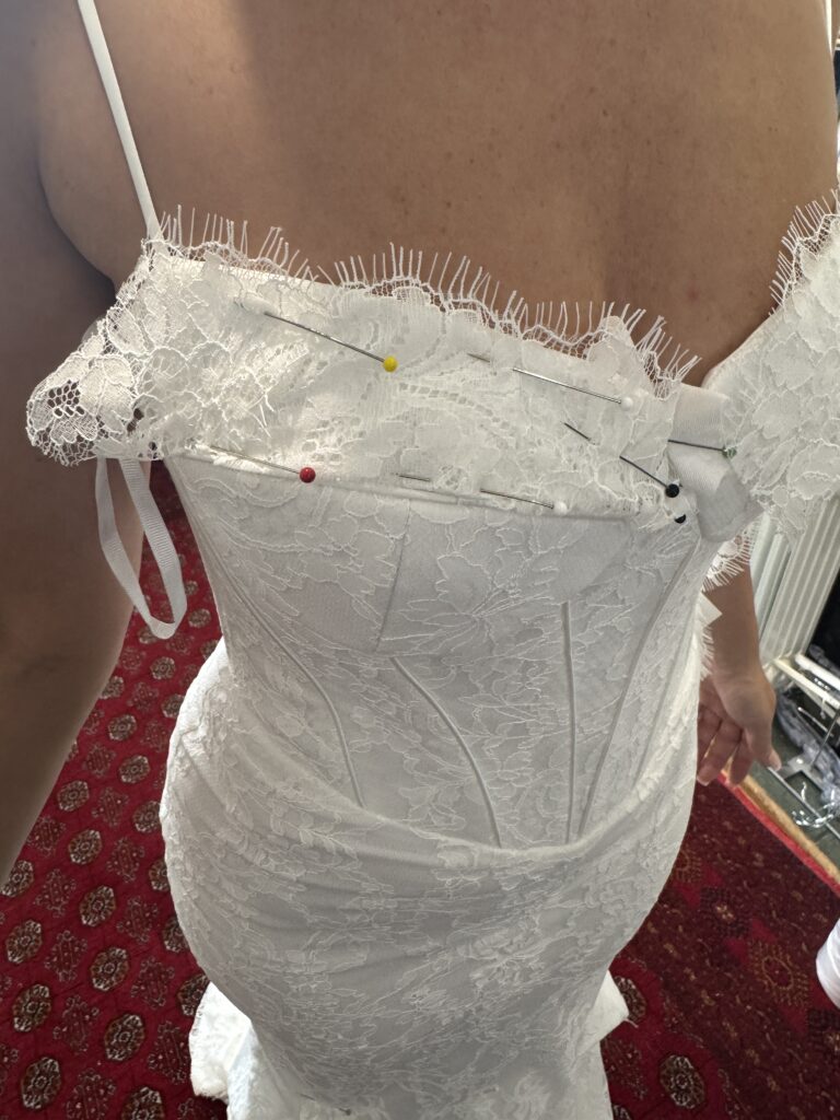 close up of corset edges showing lace addition.