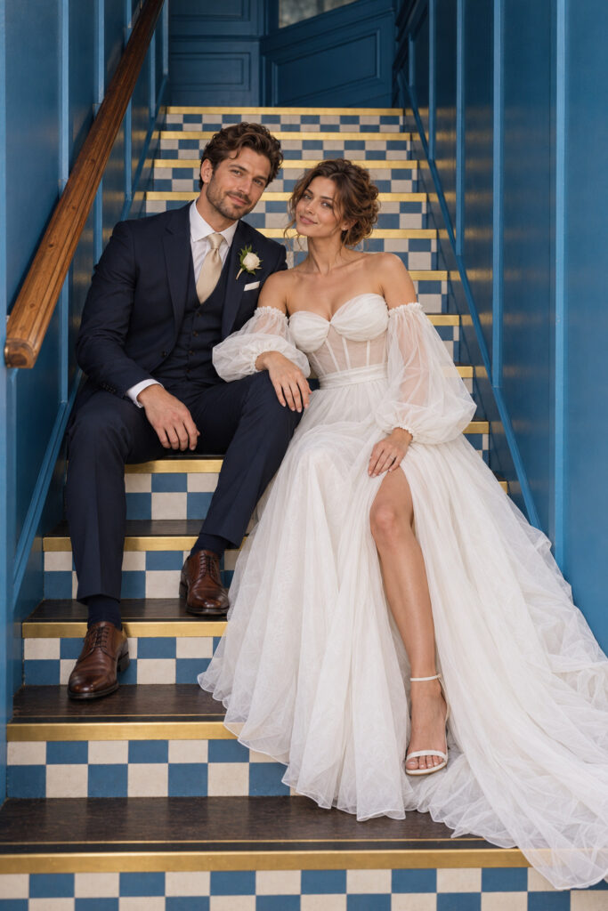 Bride and Groom on wedding day on staircase.