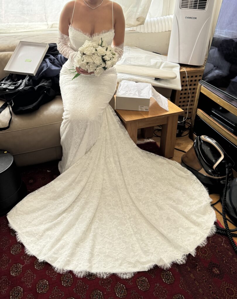 final dress fitting showing all the adjustments carried out to perfection.