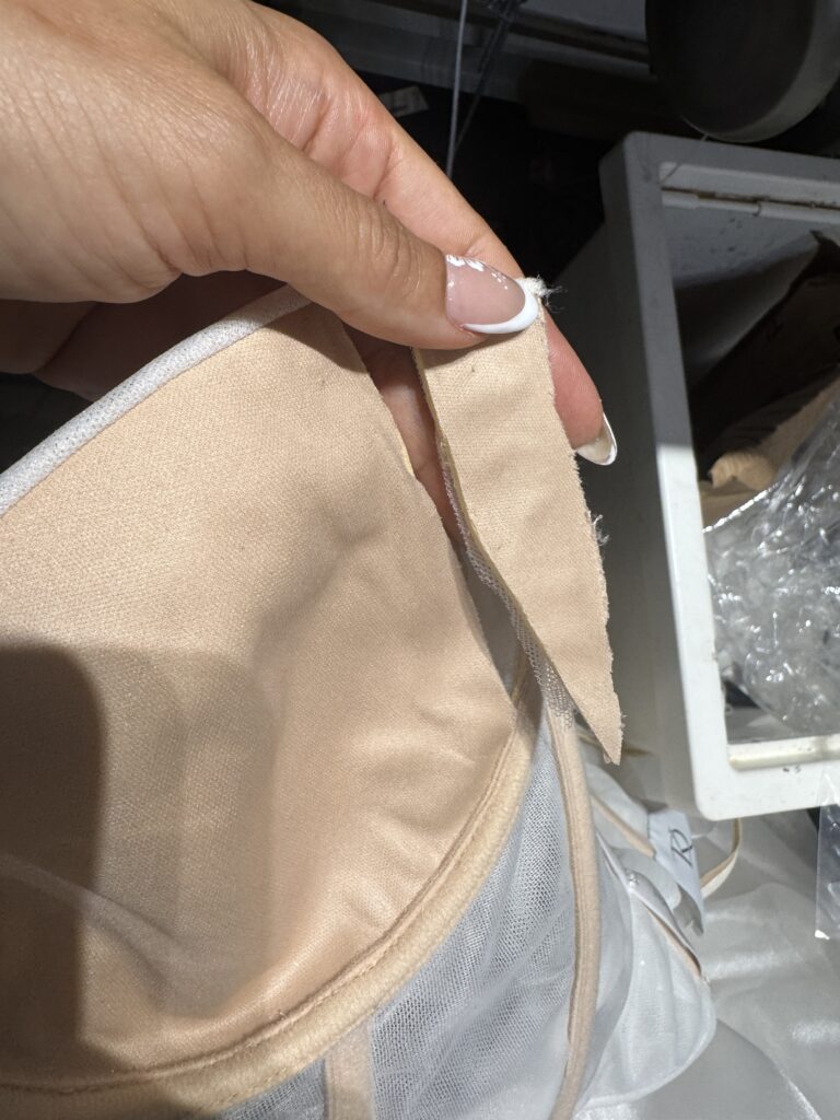 Daria Karlozi Bridal Alterations cup reduction inside view of dress.