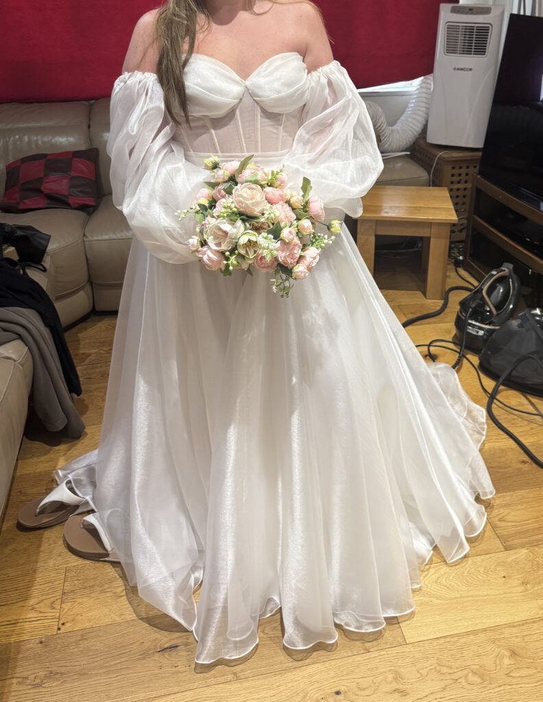 Redhill Bride with her Daria Karlozi bridal dress Vigo tried on her wedding dress for her final fitting at my Sutton Studio admiring her perfectly fitted dress.