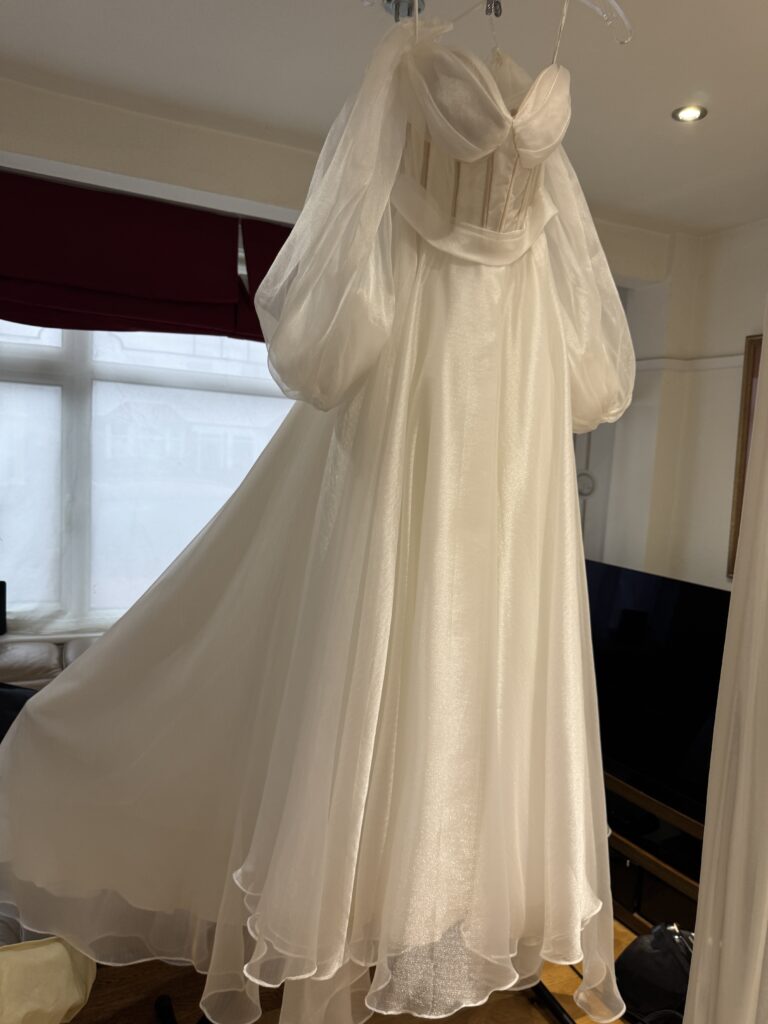 Daria Karlozi Wedding Dress Alterations after completion the dress was fully steam pressed professionally.